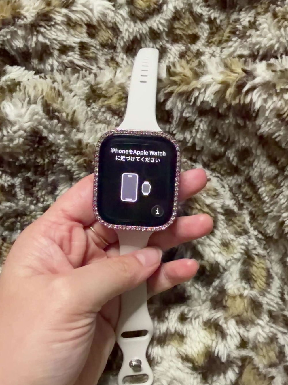Apple Watch with Pink Sparkle Bezel and White Sport Band
